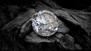 An image of a diamond on coal showing When Crises Forge Stronger Nonprofits.