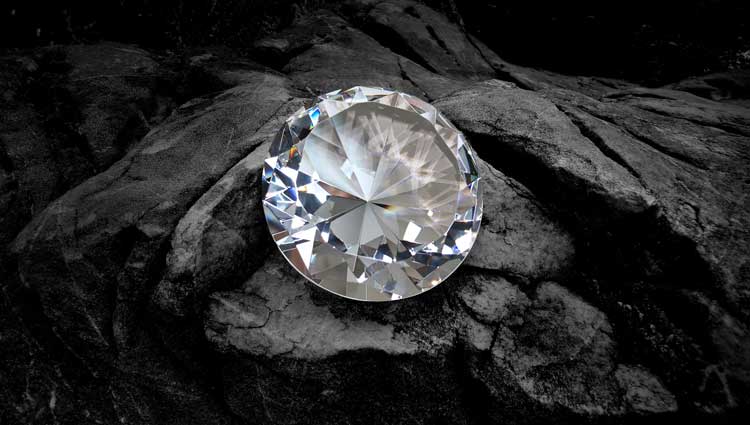 An image of a diamond on coal showing When Crises Forge Stronger Nonprofits.