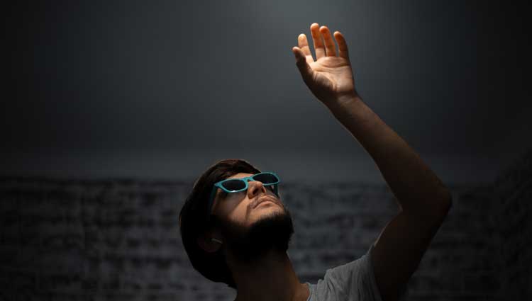 An image of a man looking up just like Philanthropy Needs to Look Around, Not Just Up.