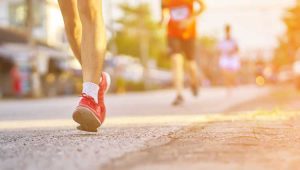 An image of a person running a marathon similar to a campaign.