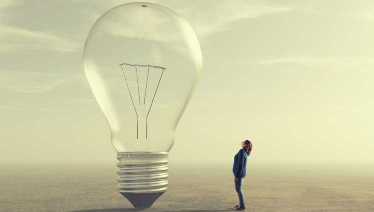 An image of giant lightbulb showing What Inspires Big Gifts? Big Ideas.